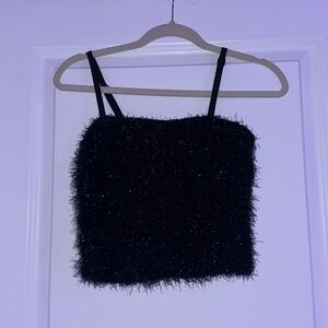 black fuzzy top with shiny/sparkly look